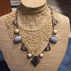 Adjustable necklace with blue/ivory stones